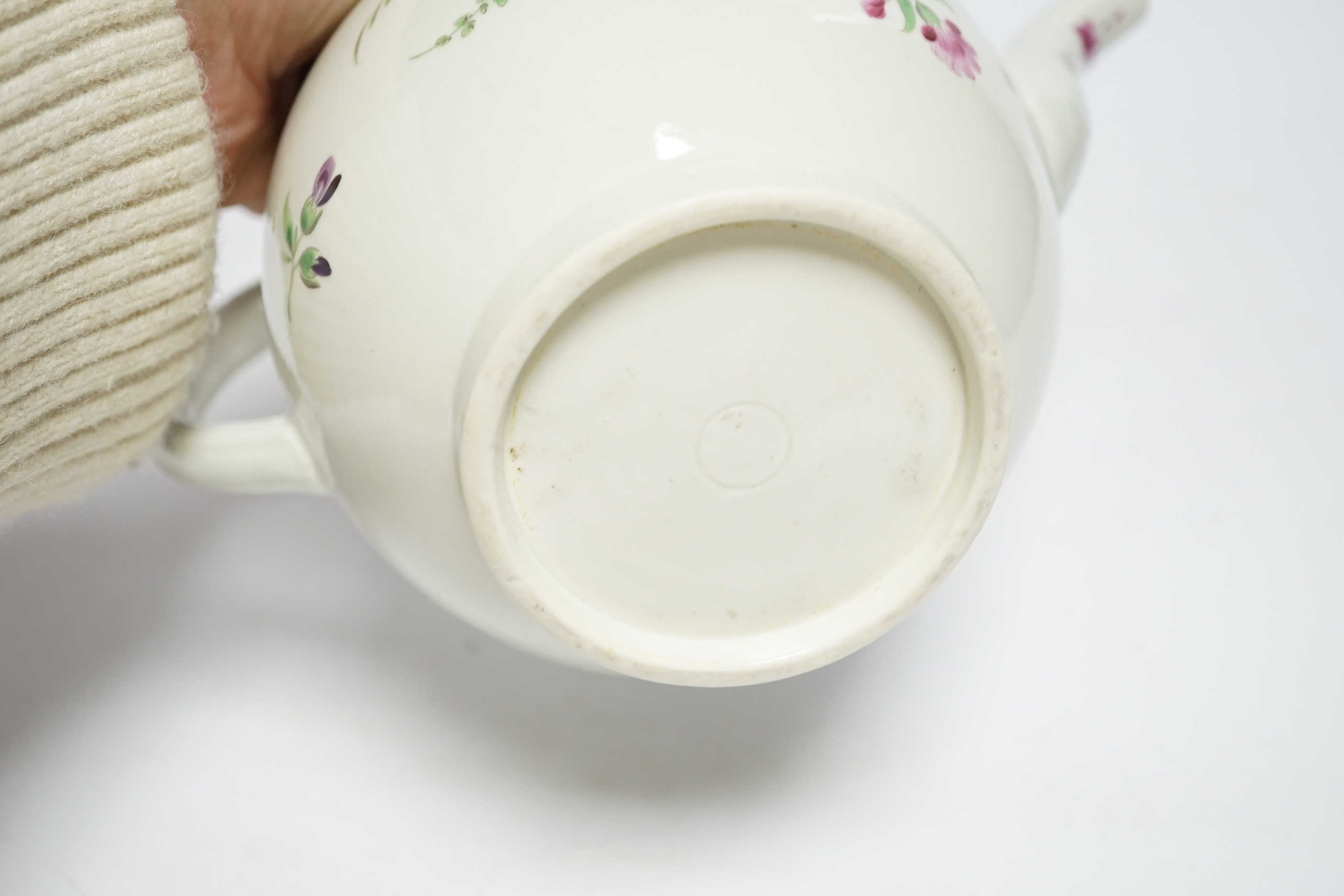 A Worcester globular teapot c. 1780, hand painted with flowers, 21cm wide